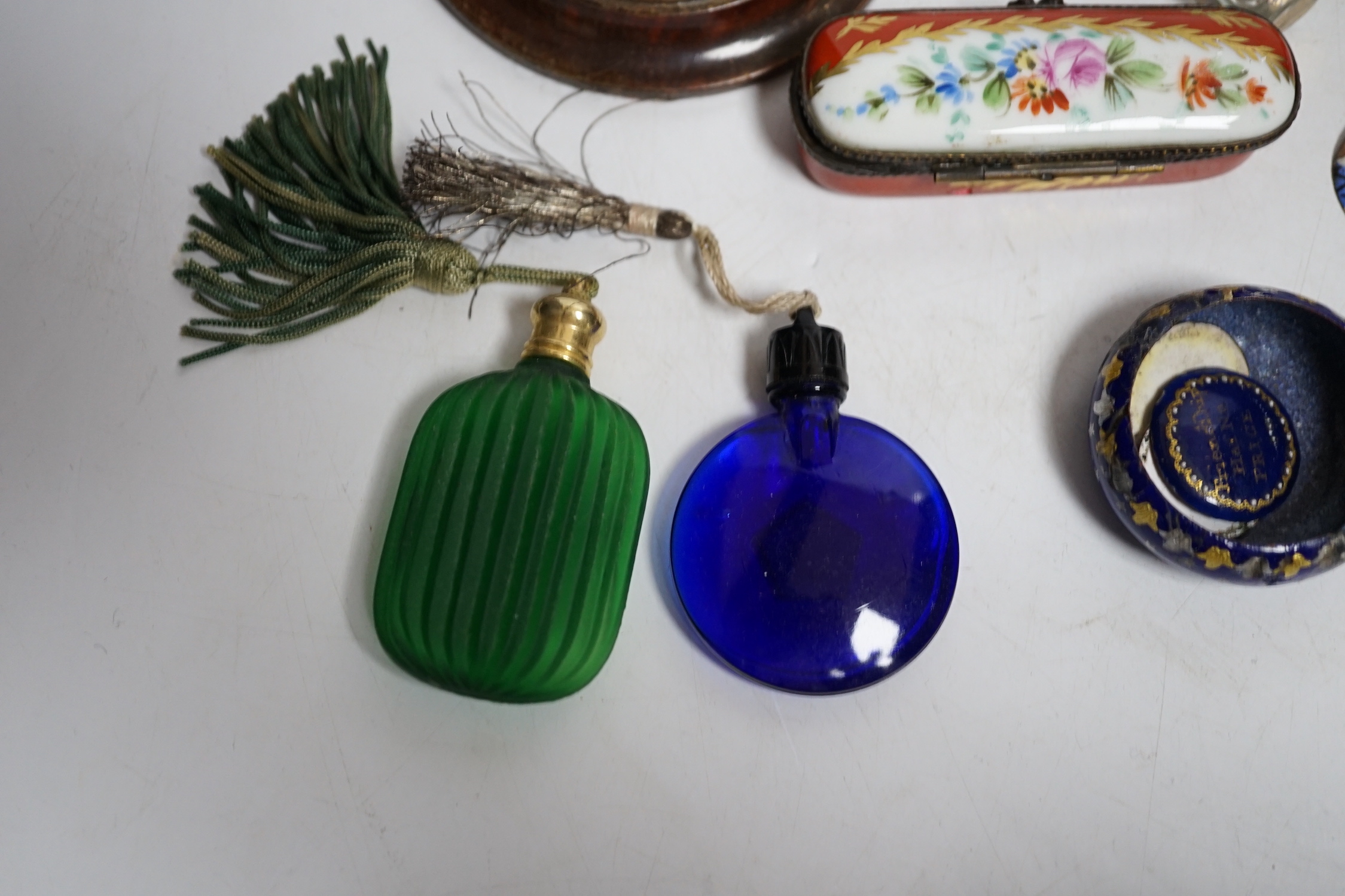 A collection of scent bottles, a miniature antiquity vessel and a miniature of a lady